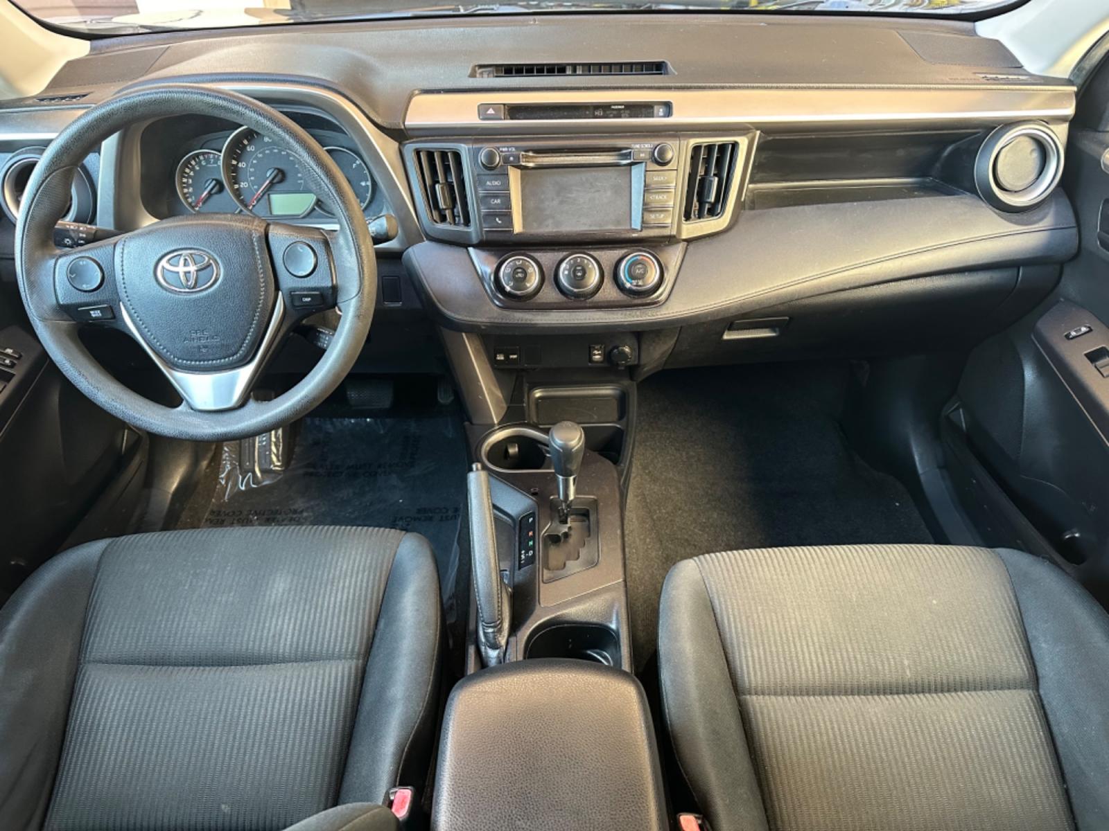 2016 Gray /Black Toyota RAV4 (JTMZFREVXGJ) , AUTOMATIC transmission, located at 30 S. Berkeley Avenue, Pasadena, CA, 91107, (626) 248-7567, 34.145447, -118.109398 - Crown City Motors is a used “Buy Here Pay Here” car dealer in Pasadena CA. “Buy Here Pay Here” financing, means that when you purchase your vehicle from our dealership, that you make the payments to the dealership as well. We do not need the banks approval to get you approved for a used auto - Photo #11